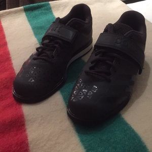 Adidas powerlifting shoes.